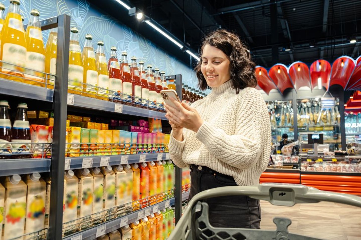 Woman Shopping with a handheld device