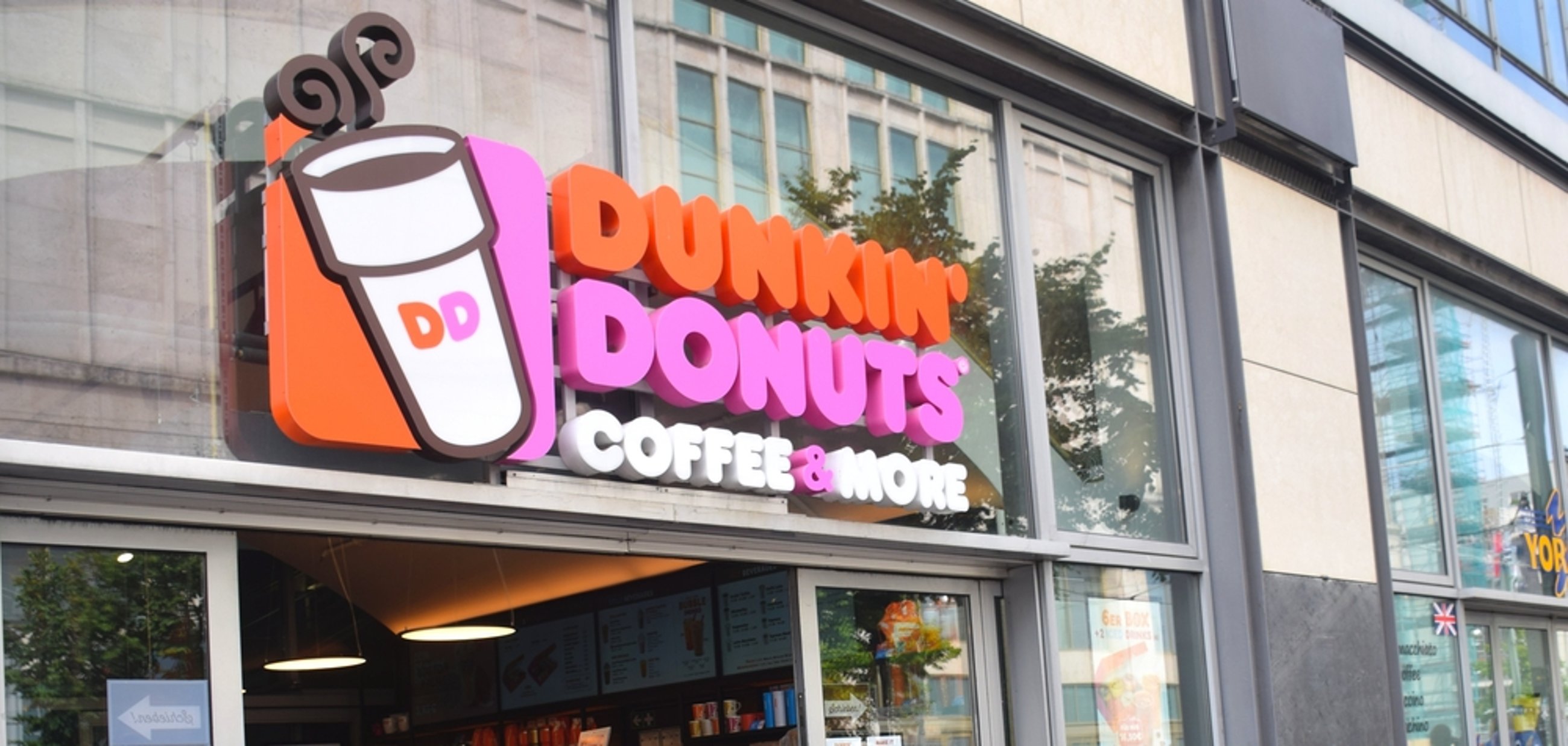 Dunkin' Donuts sign above door