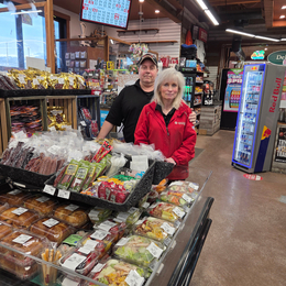 Greg and Tracy Urichuk inside Crossroads Market convenience store