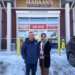  Neelam Madan and Anil Madan in front of their store, Madaan's Country Market