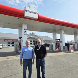 MTM Retail Gas Limited | Masstown Petro-Canada owners standing in the forecourt