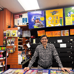 Jay Modi, owner of Willow Smokes and Cigars stands behind the counter