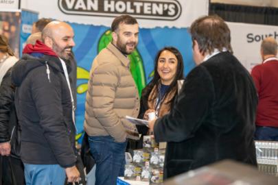 Attendees trying samples at the 2023 Convenience U CARWACS Show