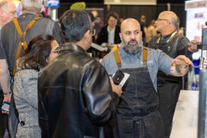 Attendees trying samples at the 2023 Convenience U CARWACS Show