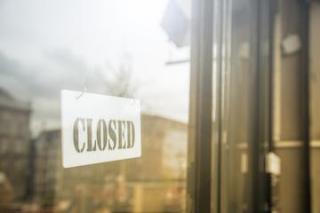 Closed sign on storefront