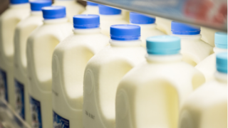 Milk jugs in store