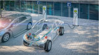 generic electric car with battery visible x-ray charging at public charger in city parking lot with lens flare 3d render