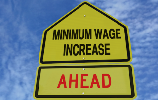 minimum wage increase ahead warning sign