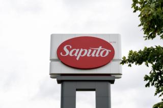 Close up of Saputo sign at their headquarters in Montreal, QC, Canada. Saputo is a Canadian dairy company.