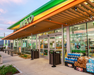 Exterior of MAPCO store with products outside the door