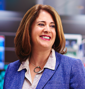 Anne Kothawala in a blue suit