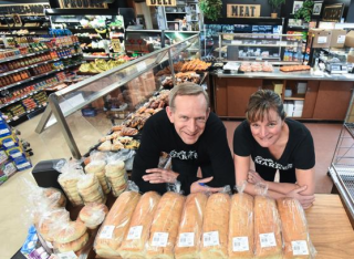 Dan and Tracy Fehr pose with freshly made bread.