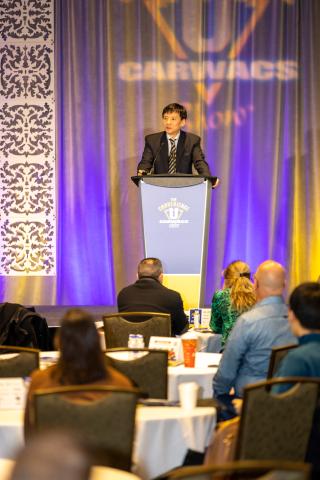 Daniel Tsai on stage at the show.