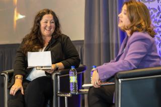 Anna Kothawala and Michelle Warren on stage.