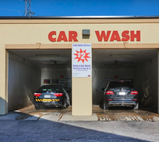 Exterior image of two cars in the car wash