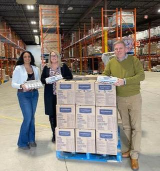 Members from Rabba, Burnbrae farms and the Mississauga Food Bank hold egg donation