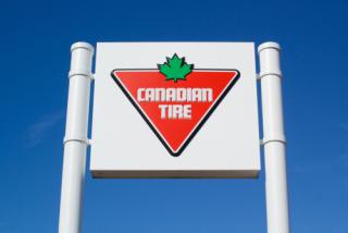 Canadian Tire store sign. Canadian Tire is a retail company selling automotive, hardware, sports, home and a variety of other products