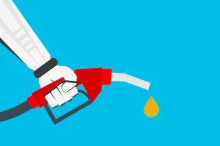 robotic hand holding gasoline nozzle with fuel drop