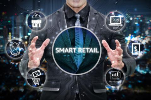 Smart retail and omni channel concept. Man business suit hand , Electric circuit graphic and info graphic of smart retail technology icons.