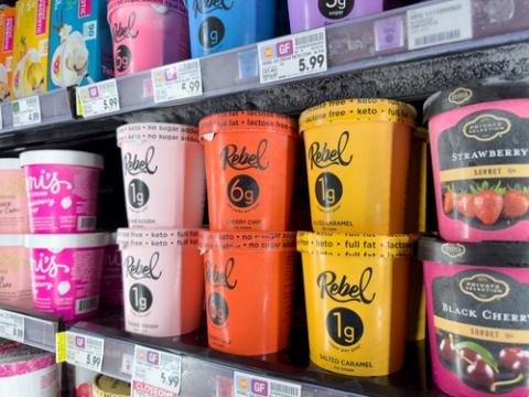 A view of several cartons of Rebel ice cream, on display at a local grocery store.