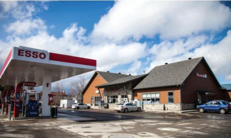 exterior of the store with Esso gas station