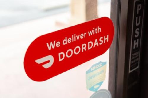 DoorDash sticker on shop door