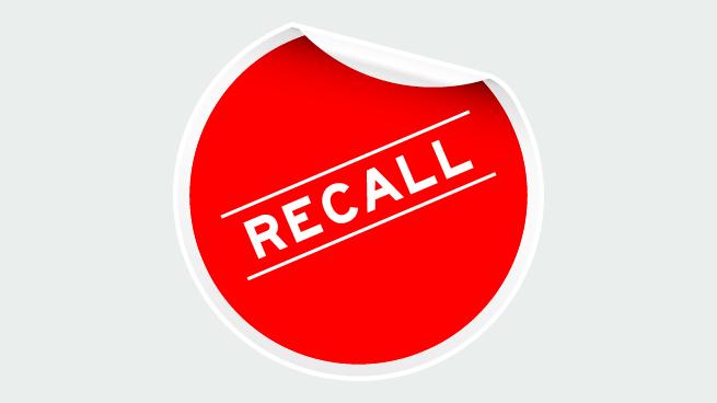 Recall notice on round sticker