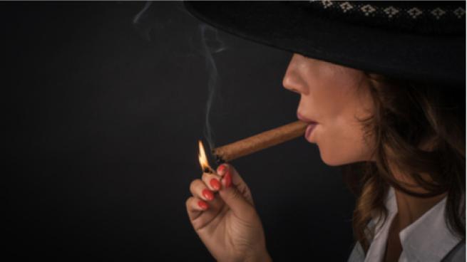 woman smoking cigar
