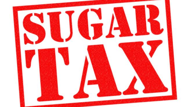 SUGAR TAX red Rubber Stamp over a white background.