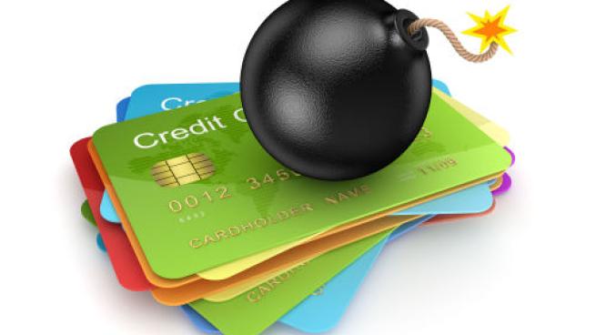 credit cards with a bomb on top