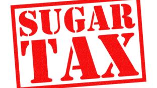 SUGAR TAX red Rubber Stamp over a white background.