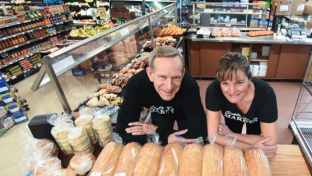 Dan and Tracy Fehr pose with freshly made bread. 