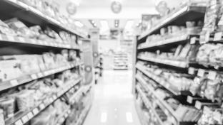 Blurred image of product shelves in convenience stores in black and white