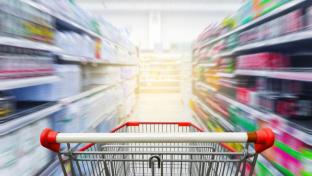 Blurred Shopping Lane with Cart